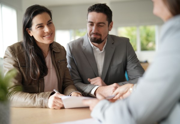 Couple receiving financial advice via Huw Watts Independent financial planning